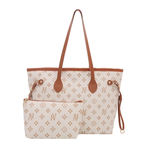 Women's cream and brown monogram tote bag set with matching zipper pouch and drawstring sides