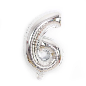 Close-up of silver foil number 6 balloon with metallic mirror finish for birthdays