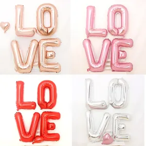Detail of 32-inch LOVE letter foil balloons in rose gold, pink, red, and silver colors