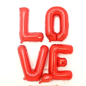 32-inch red LOVE letter balloons with a small heart for Valentine's Day party decor