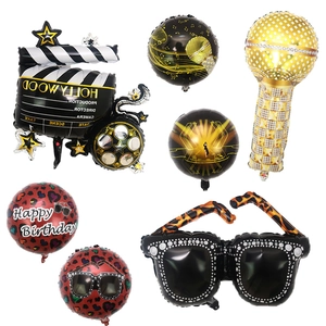 Detail of Hollywood party foil balloons set including camera microphone and sunglasses