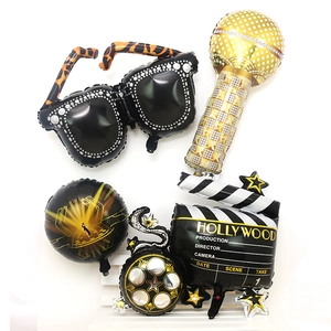 Hollywood theme foil balloon set with sunglasses, microphone and film clapboard props