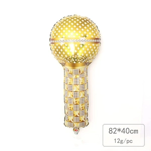 Golden microphone foil balloon measuring 82x40cm with star pattern for party decor