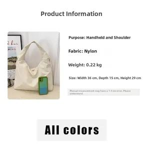 Detailed view of cream nylon tote bag with 36x15x29cm dimensions and 0.22kg lightweight spec