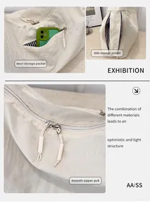 Detail view of beige nylon tote bag featuring multiple zipper pockets and striped lining
