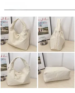 Detailed views of creamy white large capacity tote bag with multiple zipper pockets