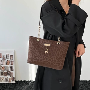 Brown leopard print large tote bag with gold deer pendant and chain shoulder strap