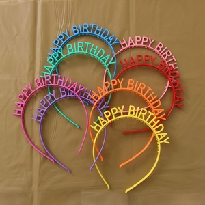 Set of seven colorful Happy Birthday headbands with anti-slip teeth and hollow lettering