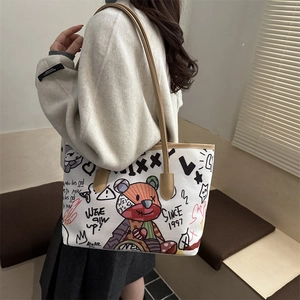 Large graffiti tote bag with cartoon bear illustration and casual leather shoulder straps