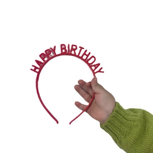 Red HAPPY BIRTHDAY party headband made of durable plastic for birthday celebrations