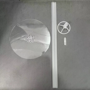 Detailed set of clear plastic balloon stand components including base and support rods