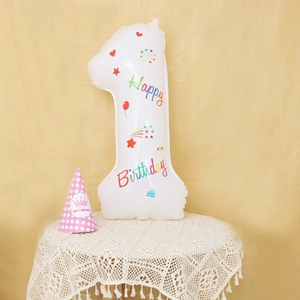 White number 1 foil balloon with colorful Happy Birthday prints for party decor