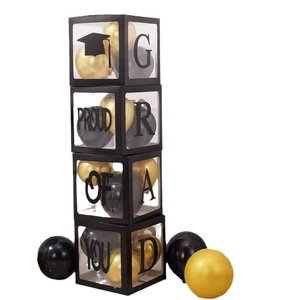 Graduation balloon box set with GRAD and PROUD OF YOU text and black frame decor