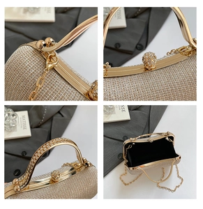 Detail of gold rhinestone evening clutch with diamond handle and chain strap closeup