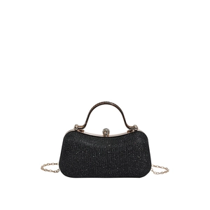 Elegant black glitter evening clutch bag with gold handle and sparkling crystal closure