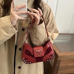 French style red crescent underarm bag with silver studs and mixed leather textures