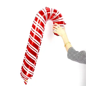 Large red and white striped candy cane foil balloon for Christmas and New Year decorations