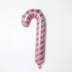 Pink and silver striped candy cane foil balloon for festive Christmas party decorations