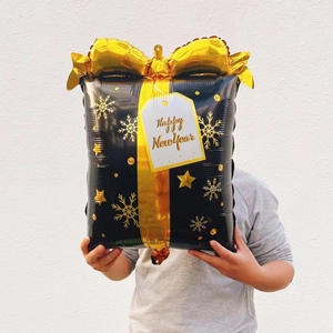 Black and gold gift box foil balloon with Happy New Year text for party decor