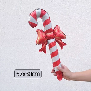 Detail of red and white striped candy cane foil balloon with dimensions 57x30cm
