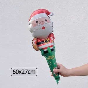 Detail of hand-held Santa Claus foil balloon with Merry Christmas text for party