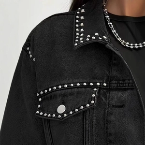 Minimalist black denim jacket for women featuring stylish silver stud bead decorations
