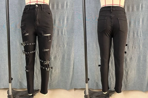 Vue avant et arrière du jean skinny noir déchiré avec détails usés et œillets métalliques