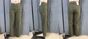 Detailed views of olive green high-waisted straight jeans with classic five-pocket design