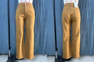 Front and back view of mustard yellow high-waisted straight-leg jeans with metal buttons
