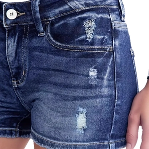 Distressed dark blue denim shorts with cat-whisker wash and raw edge details