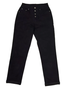 Detail of high waisted black denim jeans featuring a multi-button fly and metal rivets