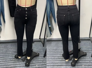 Detailed front and back view of black high-waisted skinny jeans with four silver buttons