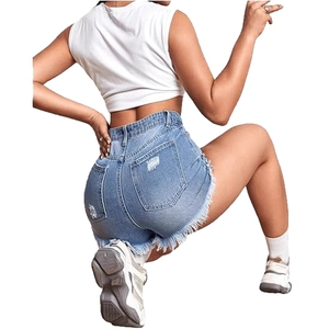 Classic light blue high waist denim shorts with back pocket distressing and frayed edges
