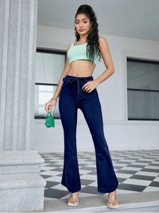 High-waist dark blue flared jeans with matching waist tie and stretch lyocell fabric