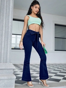 Deep blue high-waisted flare jeans with elastic fabric and stylish bow-knot belt design