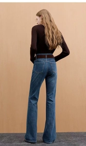 Slim fit high waisted flare jeans with double buttons and frayed hem detail on the back