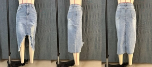 Front side and back views of light blue distressed denim skirt with frayed hem