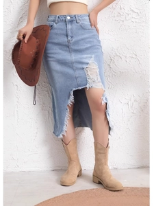Women's vintage light blue distressed denim skirt with high waist and frayed hem design