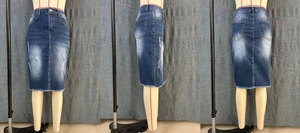 Dettagli della gonna midi in denim blu con strappi ed elegante orlo a taglio vivo