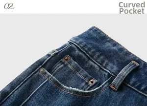 Macro detail of dark blue denim curved front pocket with contrast yellow stitching