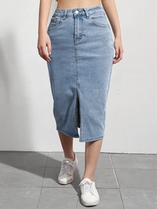 Detail of high waist light blue denim skirt featuring a stylish front slit and washed finish