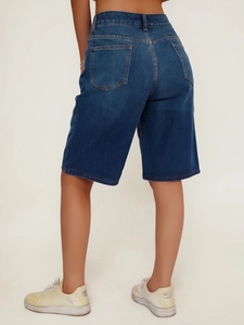 Back view of classic deep blue denim Bermuda shorts with two functional back pockets