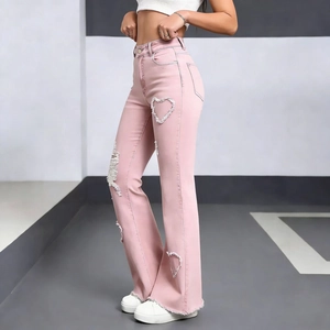 Pink high-waisted flare jeans with heart-shaped side cut-outs and distressed frayed hems