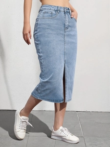 Detail of high-waist denim midi skirt featuring a front slit and light blue stretch fabric