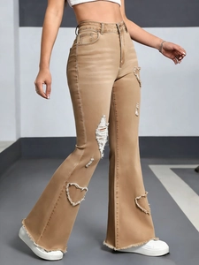 Slim fit high waist flare jeans with heart-shaped distressed cutouts and frayed hems