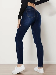 Jeans skinny blu scuro a vita alta da donna con tasche posteriori e vestibilità elastica