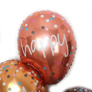 Rose gold and champagne gold happy birthday foil balloons with colorful dots decor