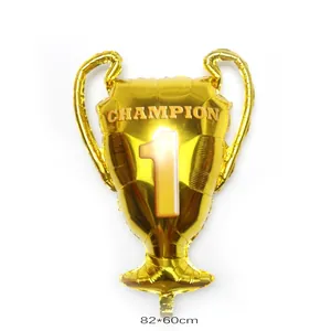 Large golden champion trophy foil balloon 82x60cm for celebration and party decoration