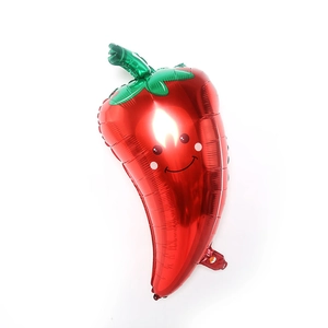 Smiling red chili pepper shaped foil balloon with green leaves for party decoration