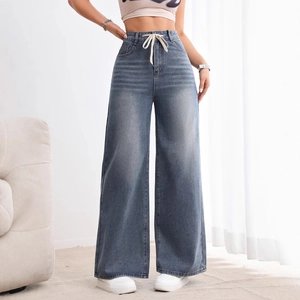 Jean large taille haute bleu pour femme avec délavage rétro et cordon de serrage blanc